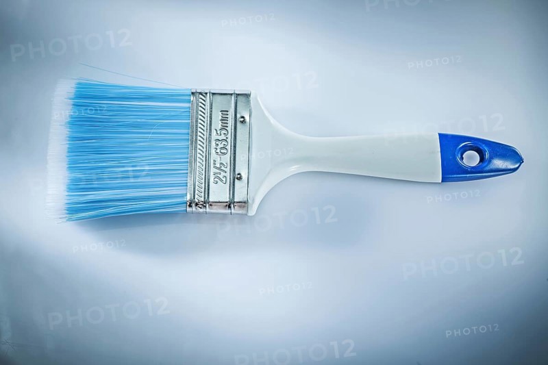 Paintbrush on white background top view