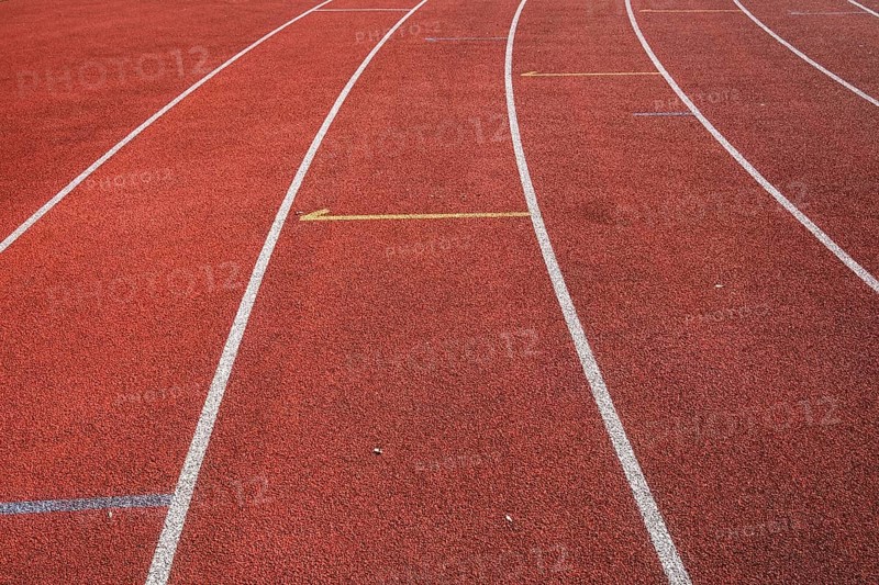 Wet synthetic track in the athletics stadium