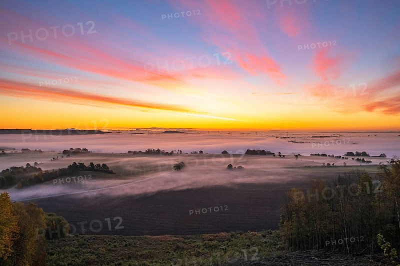Sunrise with fog in the landscape