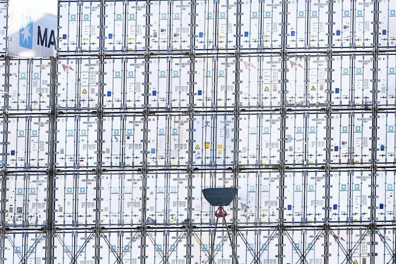 Stacked containers of the Danish logistics company Maersk on a container ship in the port of Hamburg, Germany