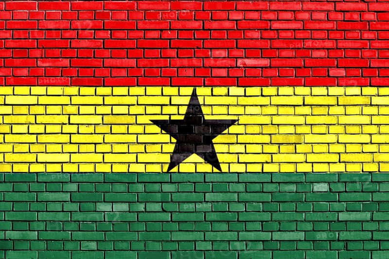 Flag of Ghana painted on brick wall