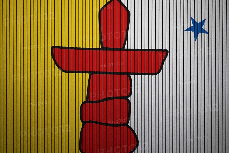 Nunavut Flag painted on the cracked grunge concrete wall