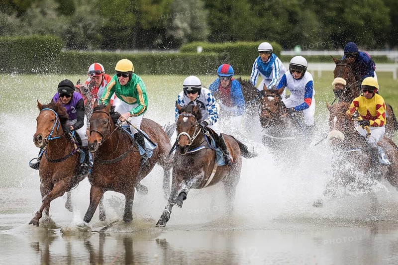 WROCLAW, POLAND - APRIL 15, 2018: International race with obstacles for five years and older horses at Racecourse WTWK Partynice. Horse Race