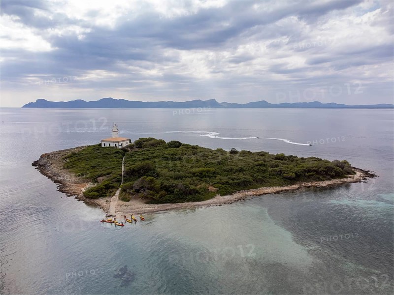 Group of canoeist in Alcanada island, Alcudia, Majorca, Balearic Islands, Spain
