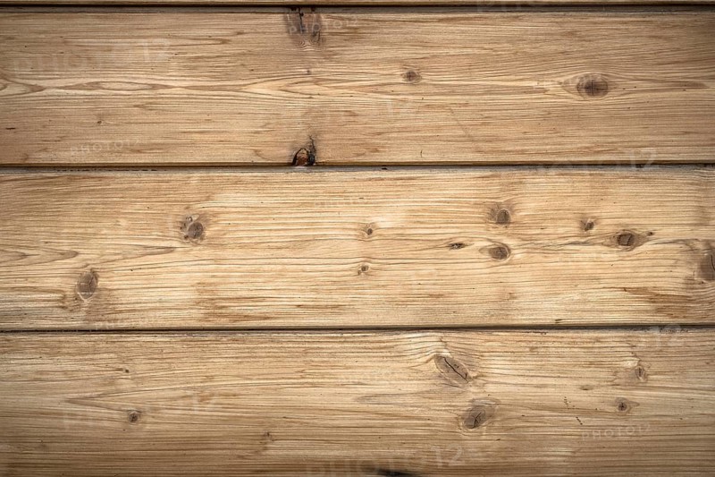Background characterized by wooden planks rustic and warm hues
