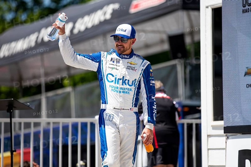 Daniel Hemric walks across the stage during driver intros prior to the Road America 180 at Road America in Elkhart Lake WI