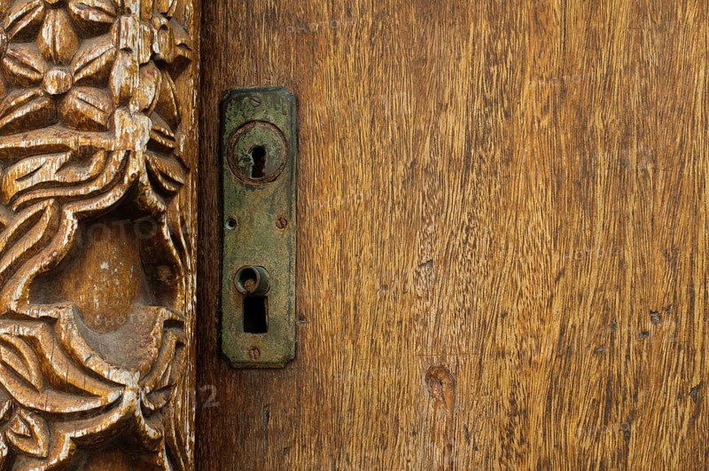 Antique ornaments on wooden door