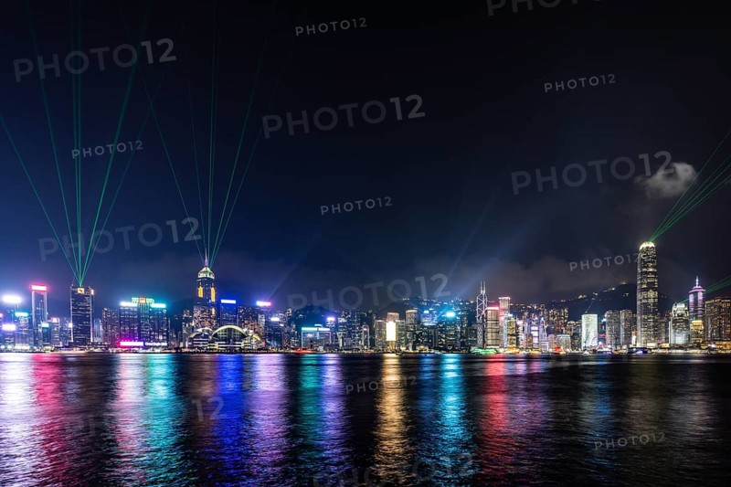 HONG KONG, CHINA - SEPTEMBER 27 2024: Night time Symphony of Light and Sound show in Hong Kong Island and Victoria Harbour from Kowloon on a autumn evening