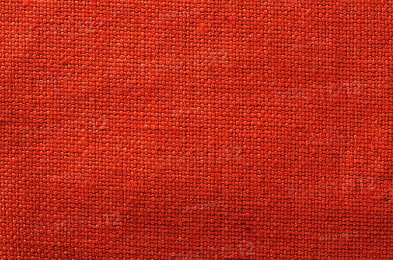 Cotton textile background. Red closeup textile texture