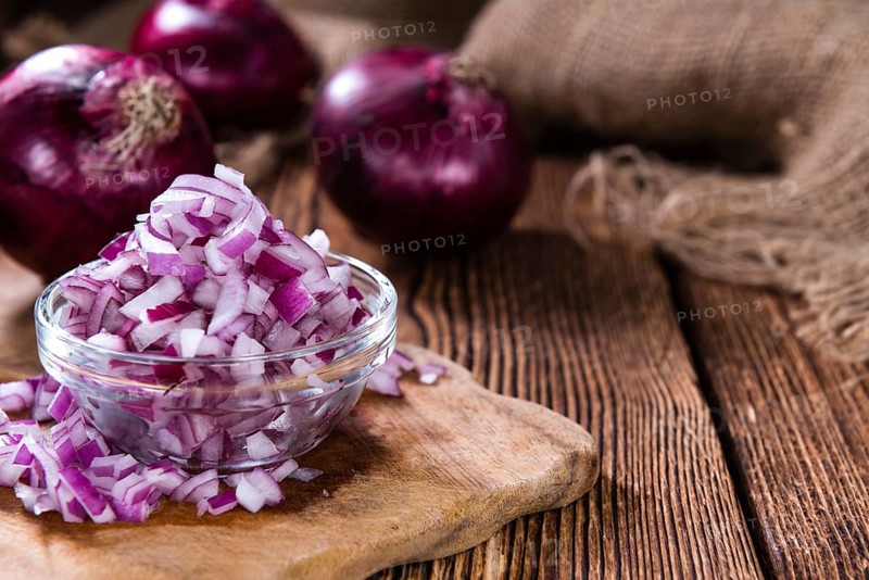 Portion of diced Red Onion (detailed close-up shot)