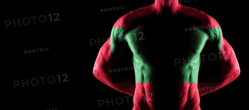 Maldives flag on muscled male torso with abs, black background