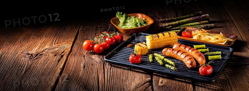 Grilled krakauer with french fries and green salad