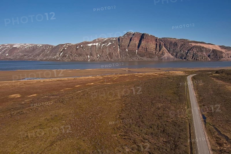 Aerial view of Austertanaveien road 890 in clear summer weather, Varanger Peninsula, Norway