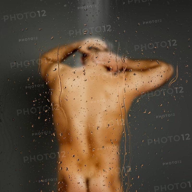 An image of a man in the shower