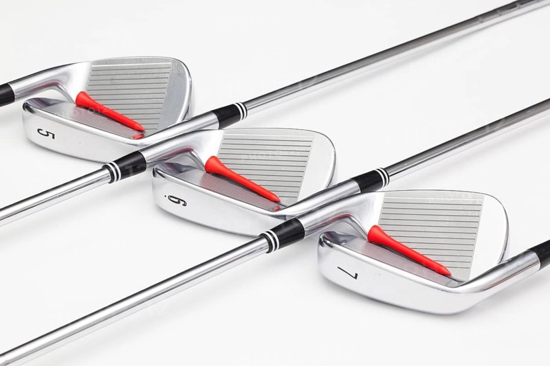 Titanium golf clubs on the white background