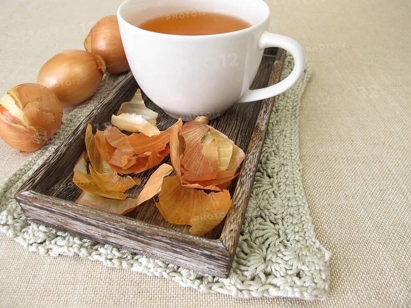 A cup of healthy onion skin tea, tea made from onion skins