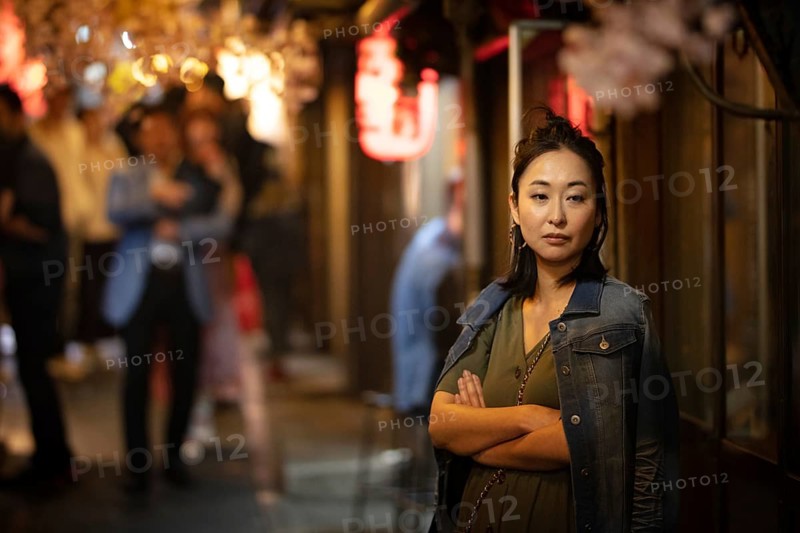 TOKYO, JAPAN - MAY 12, 2019 - People working in bars in Omoide Yokocho or 'Piss Alley' which is a famous laneway in Shinjuku, central Tokyo, Japan, Tokyo, Japan