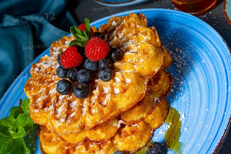 Simple sweet waffles with raspberries and blueberries