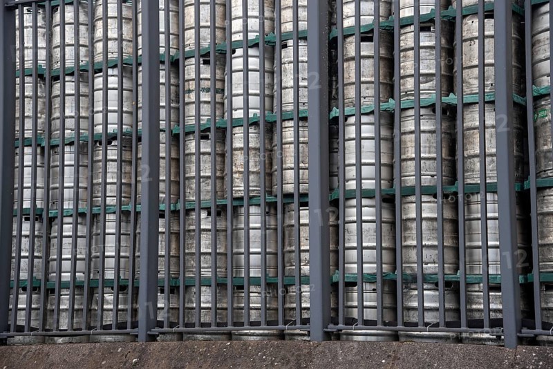 Stack of beer barrels in a brewery factory
