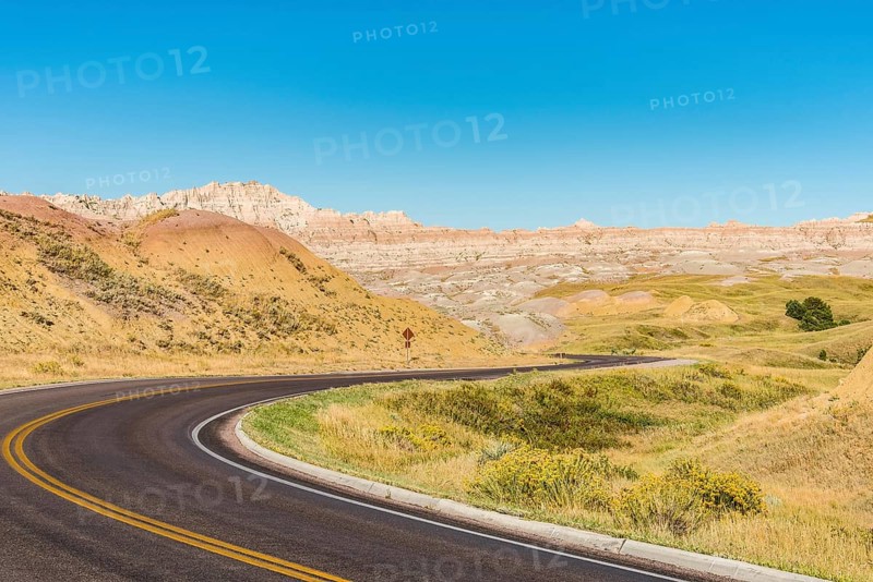 Fascinating colorful hills along the road leading through Badlands National Park, USA