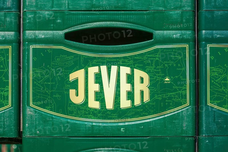Stacked Jever beer crates in front of the Frisian Brewery, Jever Brewery, Jever, East Frisia, Lower Saxony, Germany