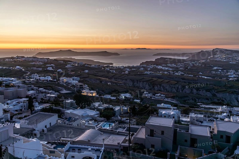 Evening mood after sunset, view from Pyrgos to the archipelago of Santorini, island of Santorini, Cyclades, Greece