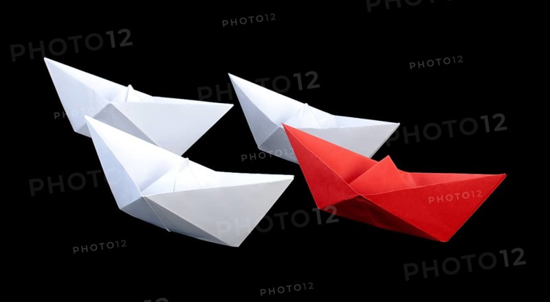 Winner red paper ship. Leadership conception