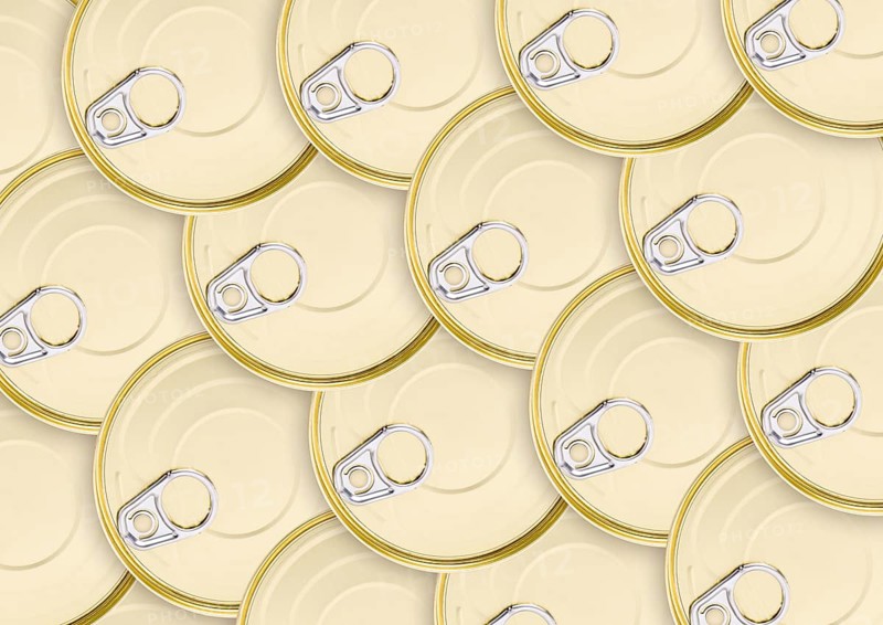 A lot of round golden cans with keys
