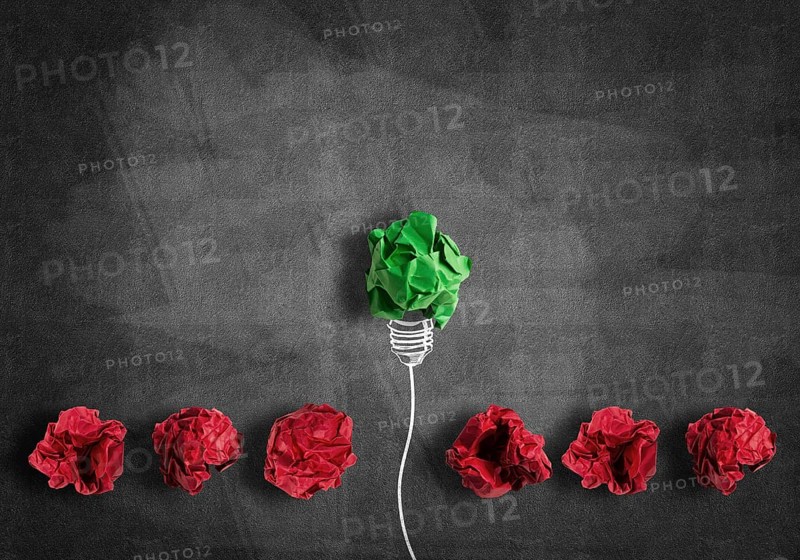 Inspiration concept with crumpled paper light bulb as good idea