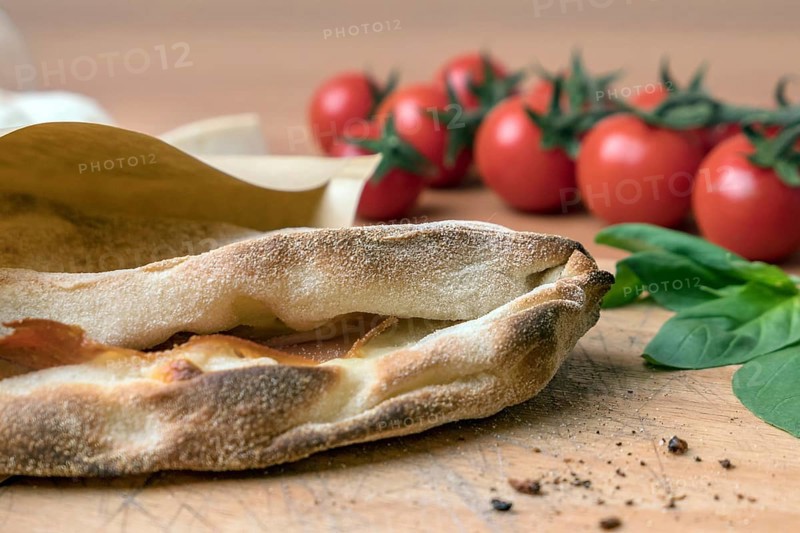 Pinsa romana and scrocchiarella gourmet italian cuisine. Traditional dish in italy