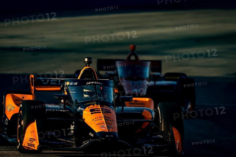 As the sun starts to set, NTT INDYCAR SERIES driver, PATO OWARD (5) (MEX) of Monterey, Mexico races through the turns during the Hy-Vee Milwaukee Mile 250's at The Milwaukee Mile in West Allis, WI, West Allis, United States of America