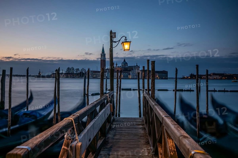 Morning atmosphere, Venetian gondolas with the church of San Giorgio Maggiore in the background, Venice, UNESCO World Heritage Site, Veneto, Italy