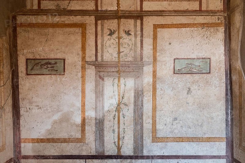 POMPEII, ITALY, MAY 04, 2022, Scenic ancient frescoes in a room of a Pompeiian villa, Southern Italy