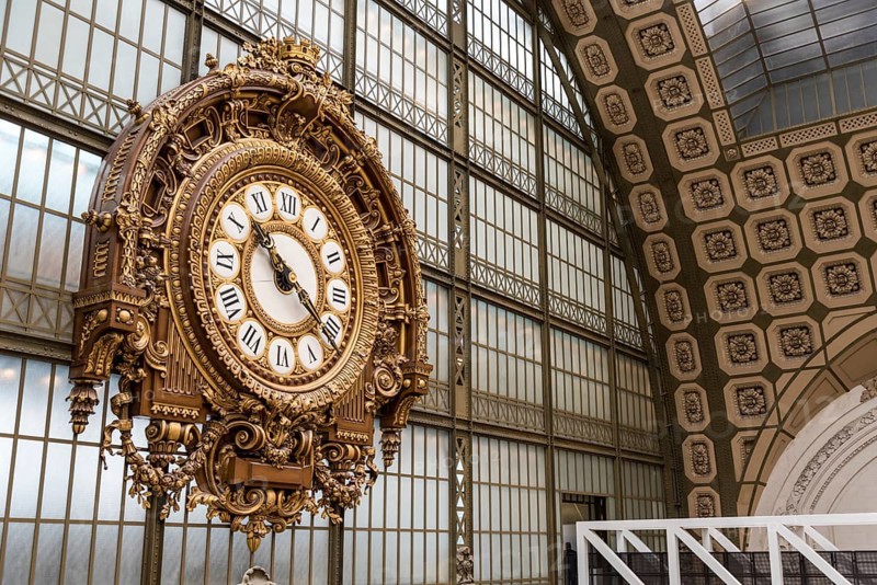 PARIS, FRANCE, MAY 29, 2022, Ornate clock at the main hall of famous museum d'Orsay in Paris, France