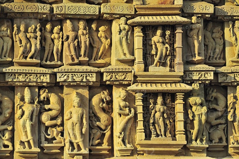 Intricately carved wall of parsvanatha temple Khajuraho madhya pradesh india