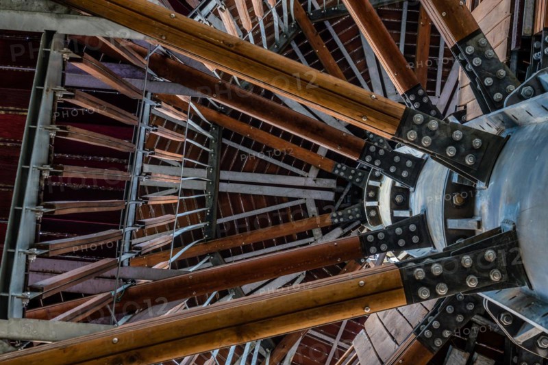 View of wooden observation tower taken from ground level looking up through levels of structure in South Korea