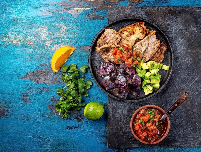 Food, Yucatan Mexican Food Pork POC CHUC poc chuck. Pork marinaded in orange juice served with avocado, purple onion and rustic tomato sauce