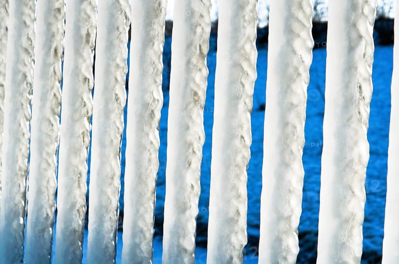 Huge icicles, icing on the sea pier