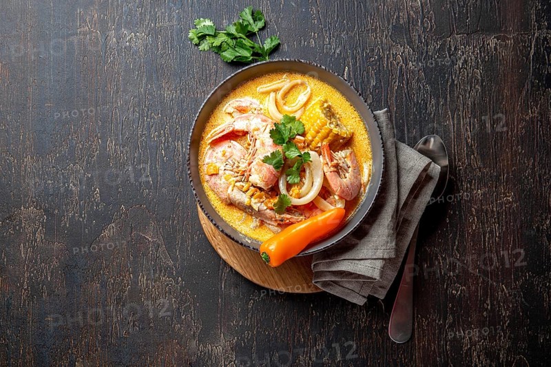 Food, Food, Peruvian seafood soup Chupe de Camarones in gray bowl, top view