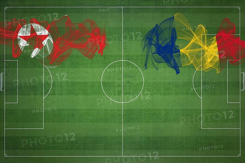 North Korea vs Romania Soccer Match, national colors, national flags, soccer field, football game, Competition concept, Copy space