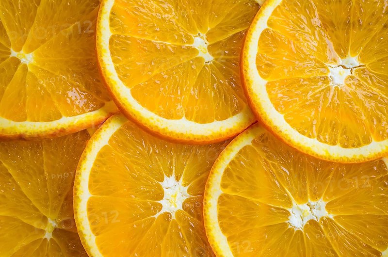 Slices of orange or tangerine isolated on white background