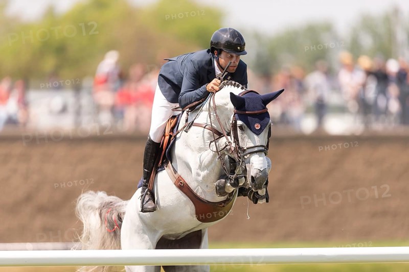 Daniel Bluman of Israel and riding Corbie V.V., compete in the 1.60m Grand Prix during The Continental international competition at Spruce Meadows, in Calgary, Canada, North America
