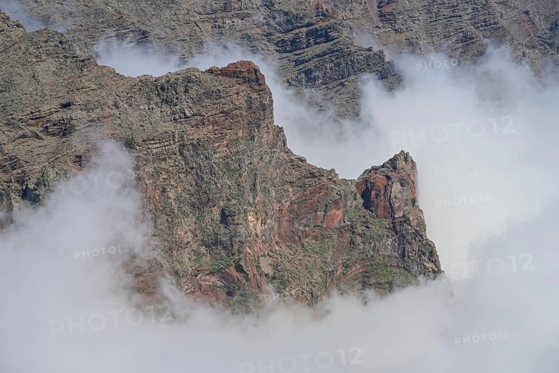 Clouds at the volcanic crater Caldera de Taburiente, seen from Roque des los Muchachos, La Palma, Spain