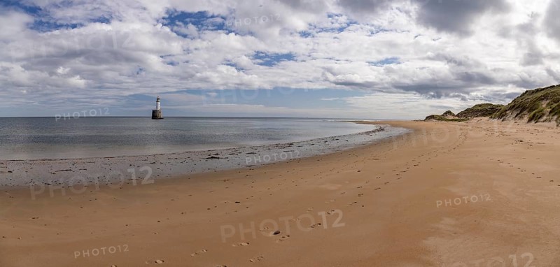 Lighthouse in the sea, Rattray Head Lighthouse, Peterhead, Aberdeenshire, Scotland, Great Britain