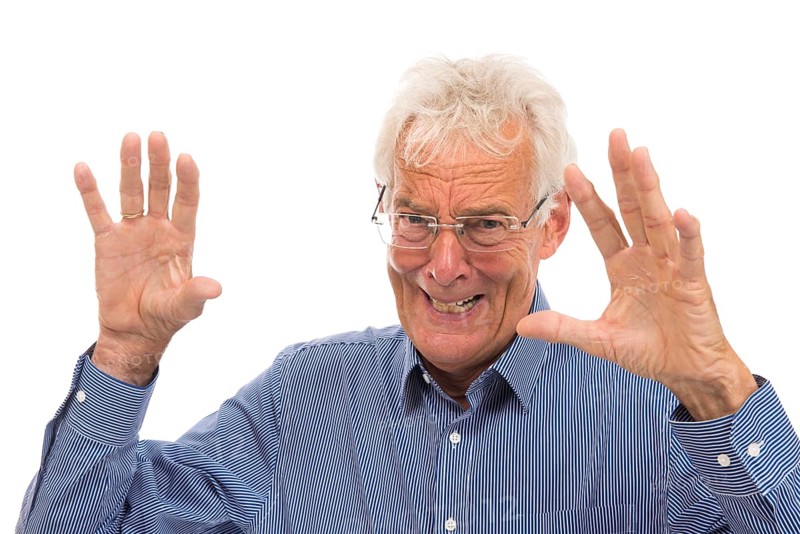 Portrait scaring senior man isolated against white background