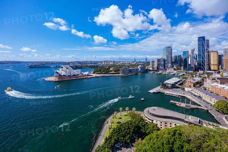 SYDNEY, AUSTRALIA, MARCH 4 2023: The Sydney CBD and surrounding harbour, including Circular Quay and The Rocks on a clear autumn day in Sydney, Australia