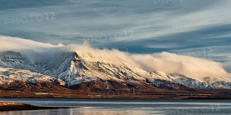 Sunrise in the mountains seen from Reykjavik, Iceland