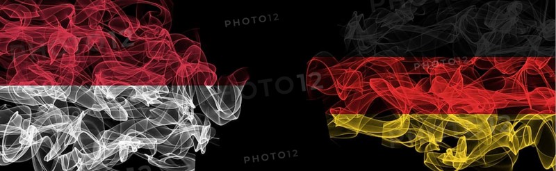 Flags of Indonesia and Germany on Black background, Indonesia vs Germany Smoke Flags