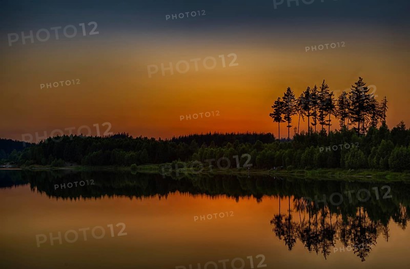 Sunset at the lake in the Harz Mountains