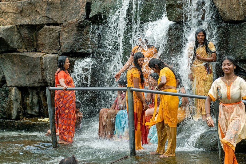 Tourists enjoying the Kodiveri waterfalls near Sathyamangalam, Tamil Nadu, South India, India, Asia